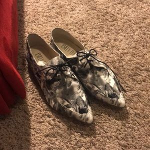 Black and white floral loafers